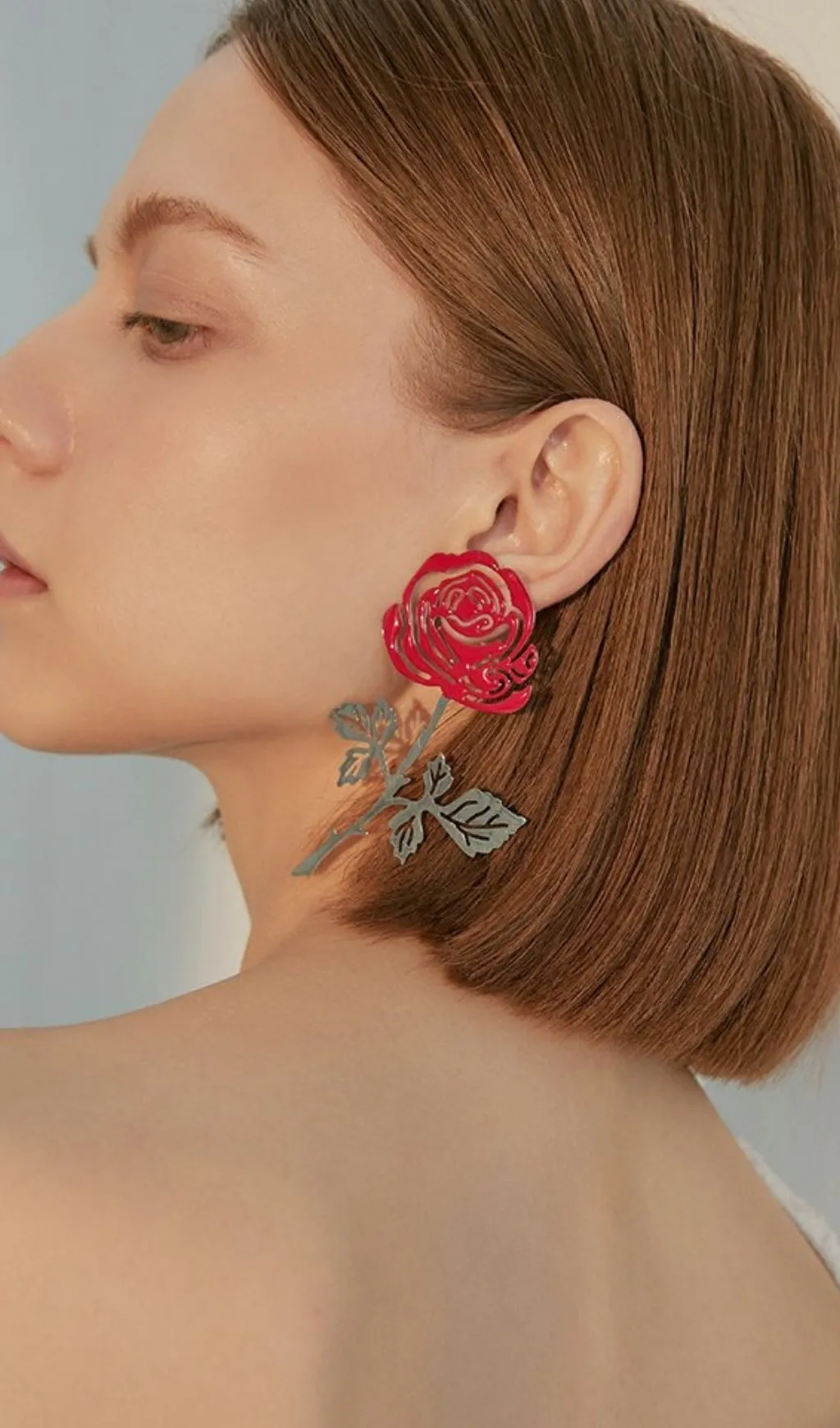 ROSE-COLORED HOLLOW FLOWER ALLOY EARRINGS Gloria Lanvin